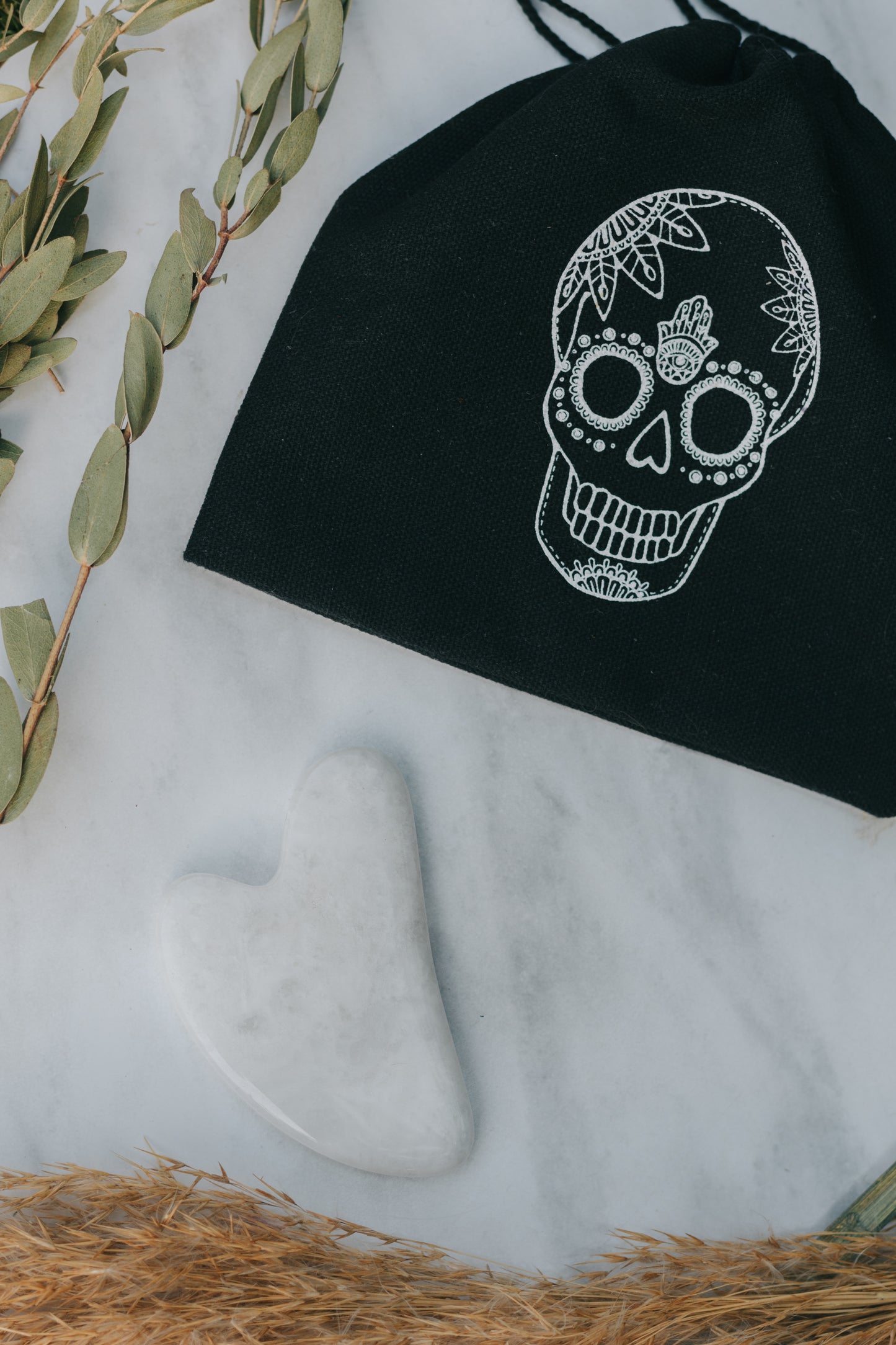 Quartz Crystal Gua Sha with Black Skull Pouch
